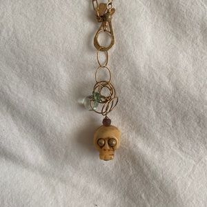 Gold skull necklace